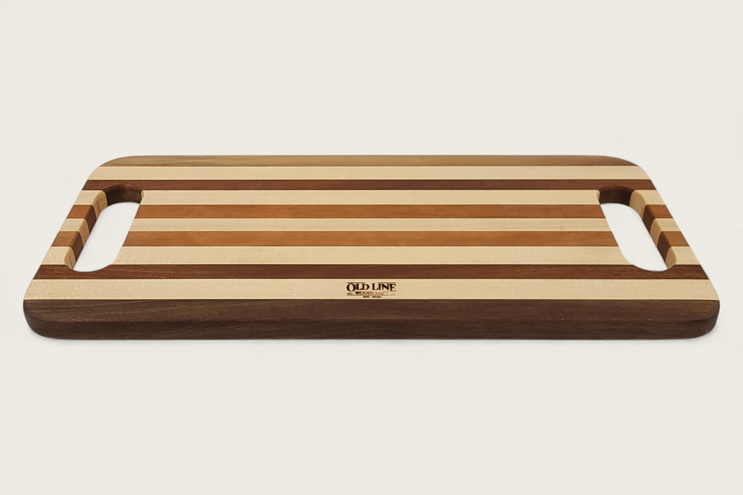 Original Maple Striped Charcuterie Board with edge-grain maple, walnut, mahogany, and cherry in a rectangular shape.