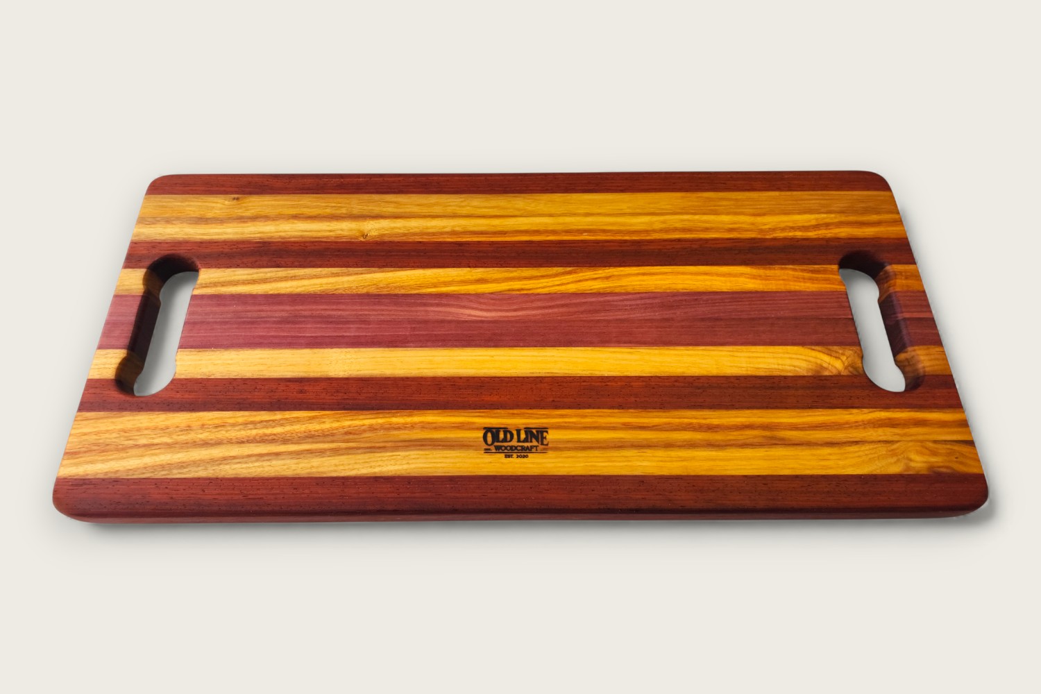 Canarywood charcuterie board (#075) with edge grain, horizontal pattern, bone handle, and tung oil finish.