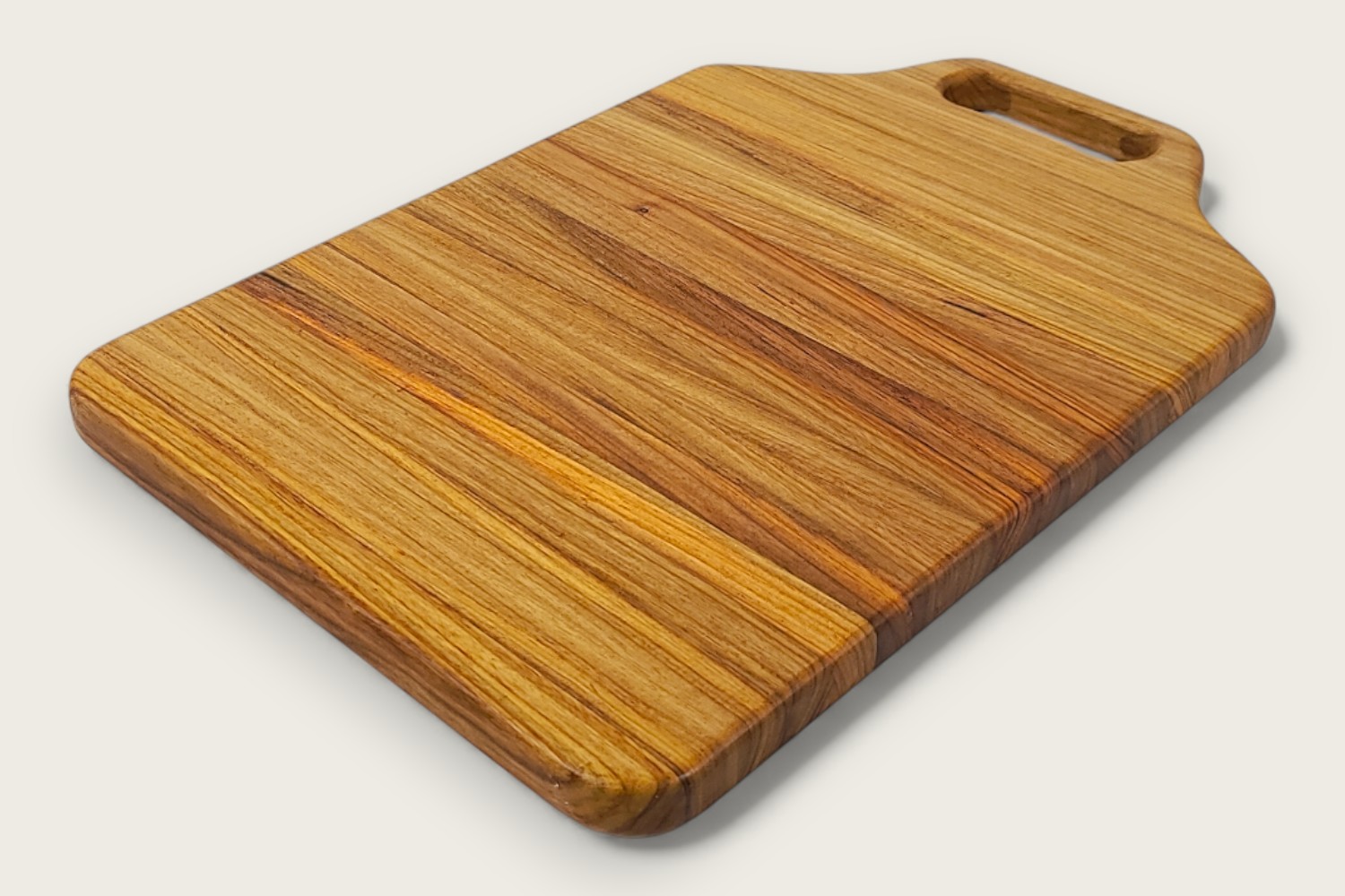 Canarywood Heritage Pro Series Board (#290) with vertical edge grain, warm golden tones, and a bone handle.