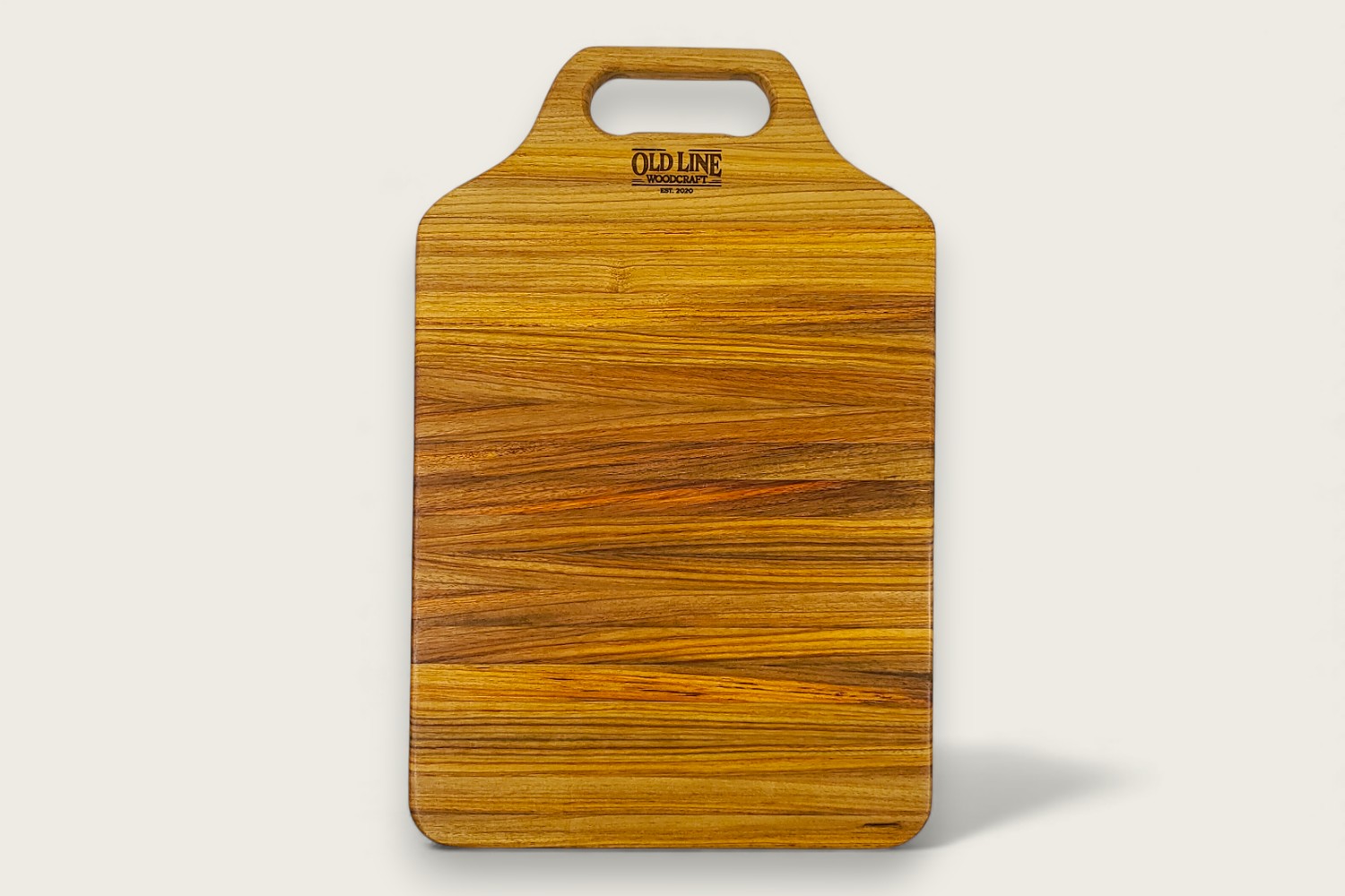 Canarywood Heritage Pro Series Board (#290) with vertical edge grain, warm golden tones, and a bone handle.