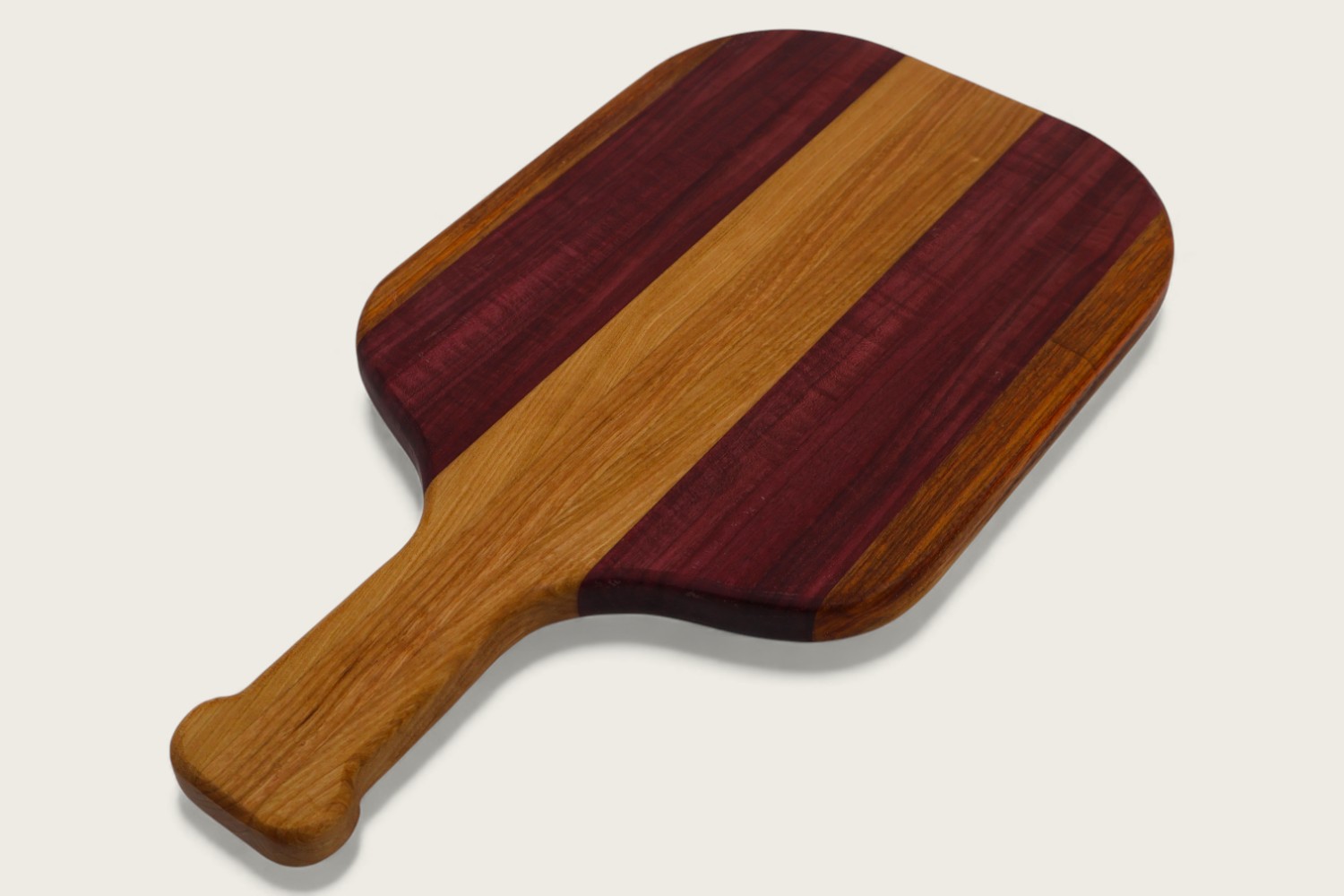 Purpleheart Pickleball Prep Board (#310) with vibrant purple edge grain, horizontal pattern, and cutout handle.