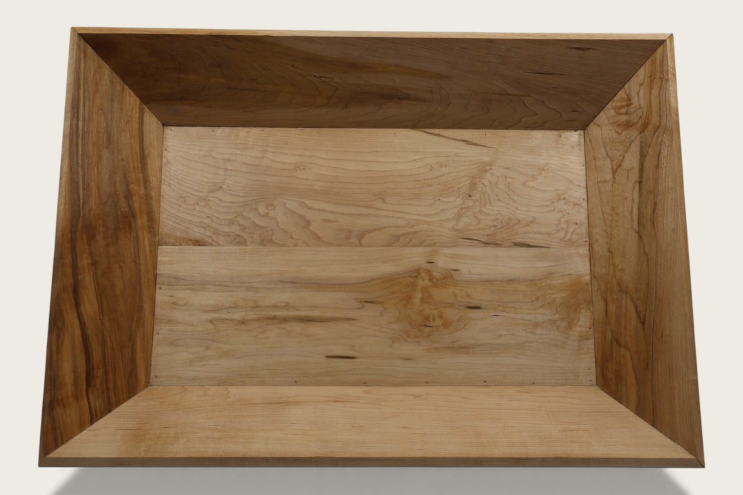 Maple catch-all bowl with light horizontal face grain, rectangular shape, and a natural tung oil finish.