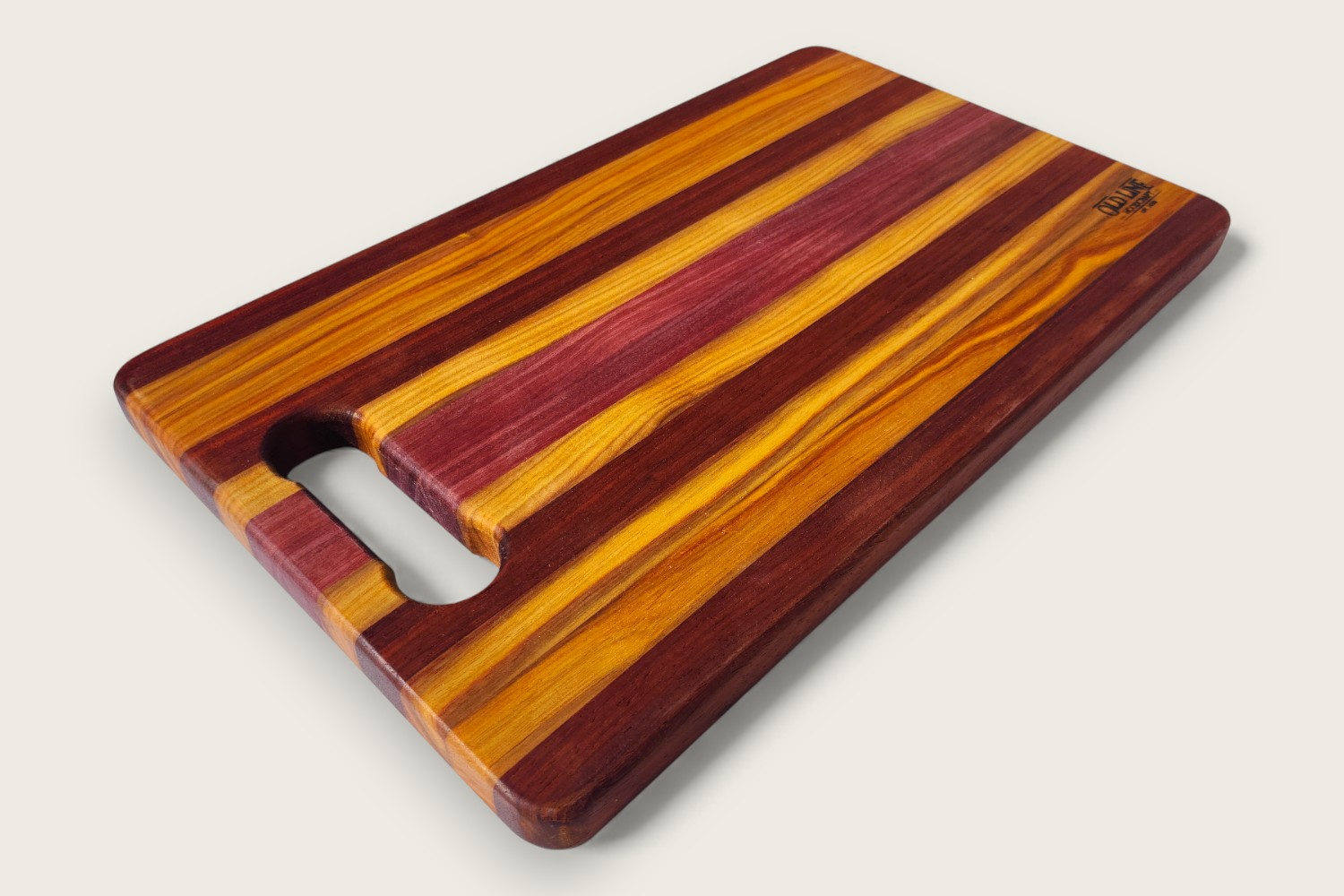 Canarywood edge-grain cutting board (#080) with horizontal pattern, rectangular shape, and warm golden tones.
