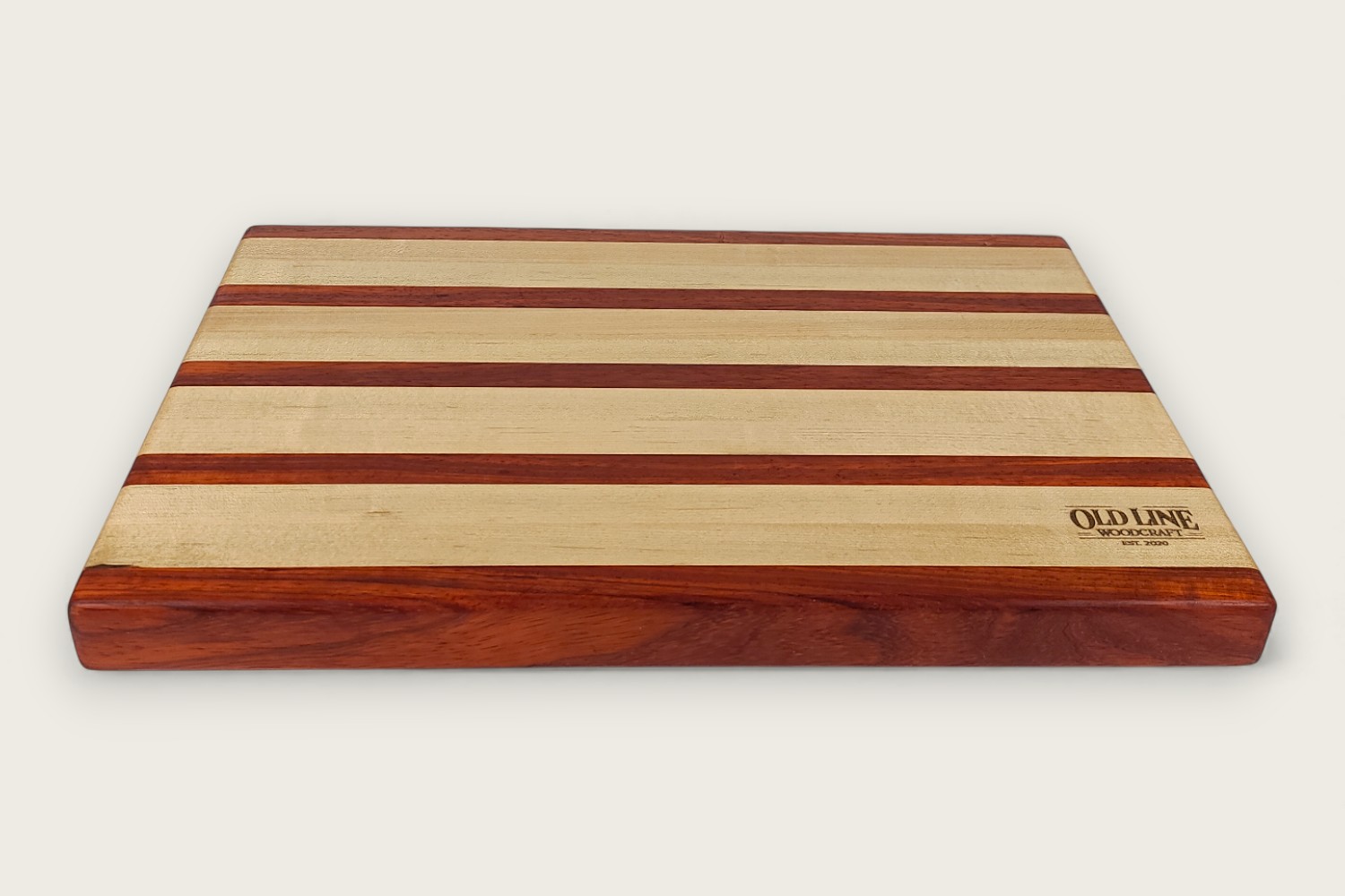 Maple butcher block board with edge grain, horizontal pattern, tung oil finish, and side scoop handles.