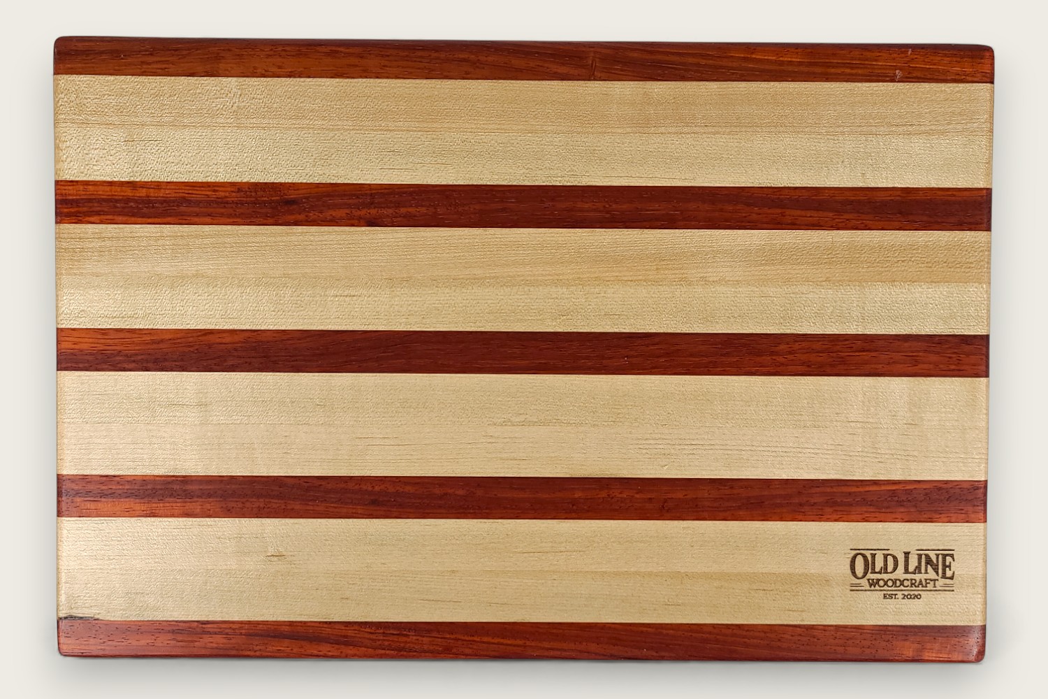 Maple butcher block board with edge grain, horizontal pattern, tung oil finish, and side scoop handles.