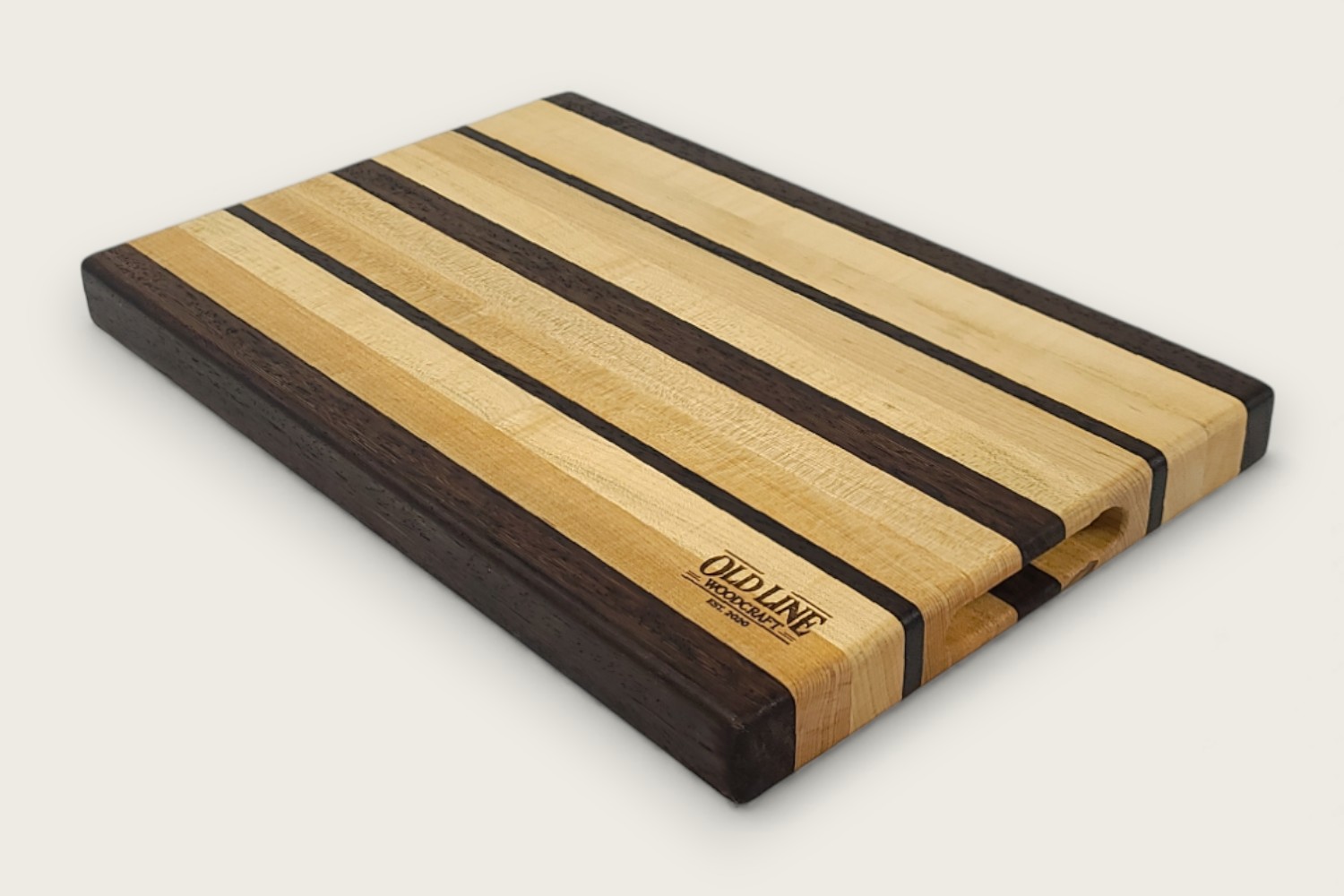 Maple & Wenge Butcher Block (#105) with light maple edge grain, dark wenge accents, and a rectangular shape.
