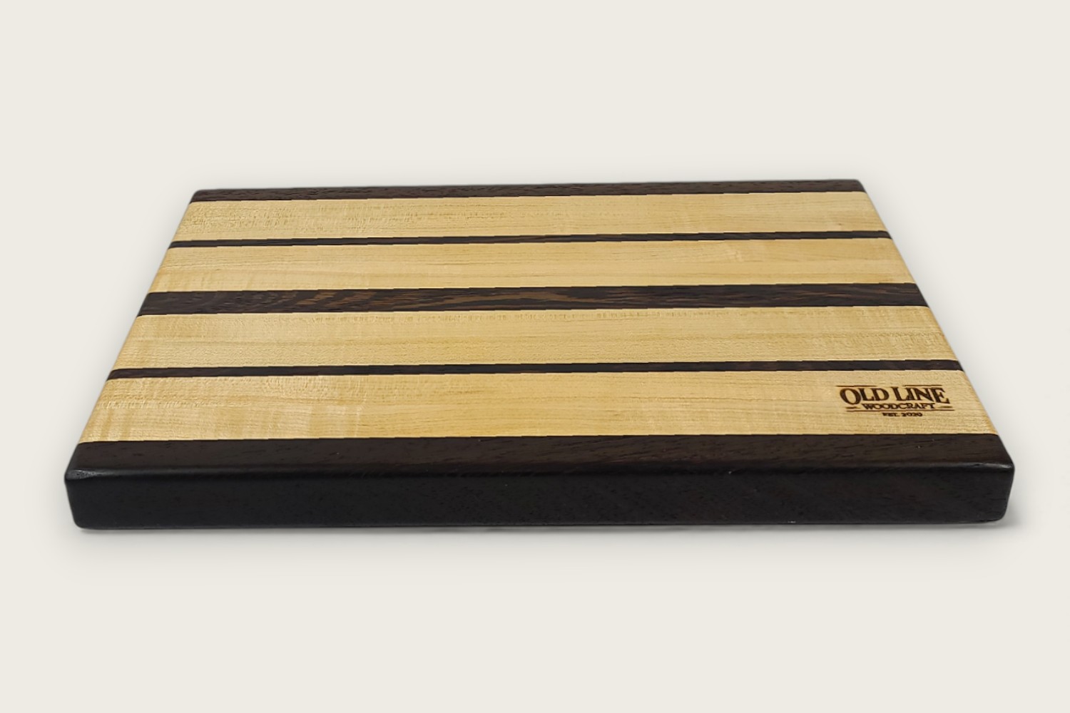Maple & Wenge Butcher Block Board (#110) with light maple edge grain, dark wenge accents, and side scoop handles.