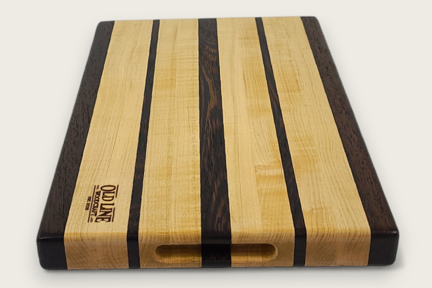 Maple & Wenge Butcher Block Board (#110) with light maple edge grain, dark wenge accents, and side scoop handles.