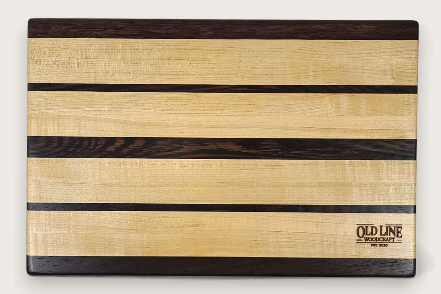 Maple & Wenge Butcher Block Board (#110) with light maple edge grain, dark wenge accents, and side scoop handles.