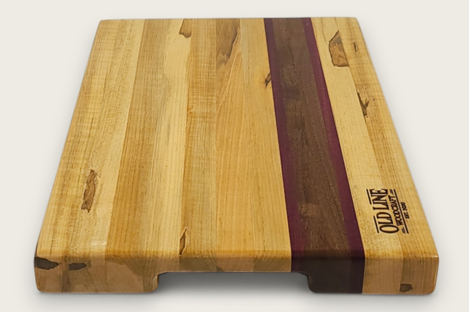 Spaulted Maple Butcher Block Board (#135) with light maple edge grain, horizontal pattern, and recessed handles.
