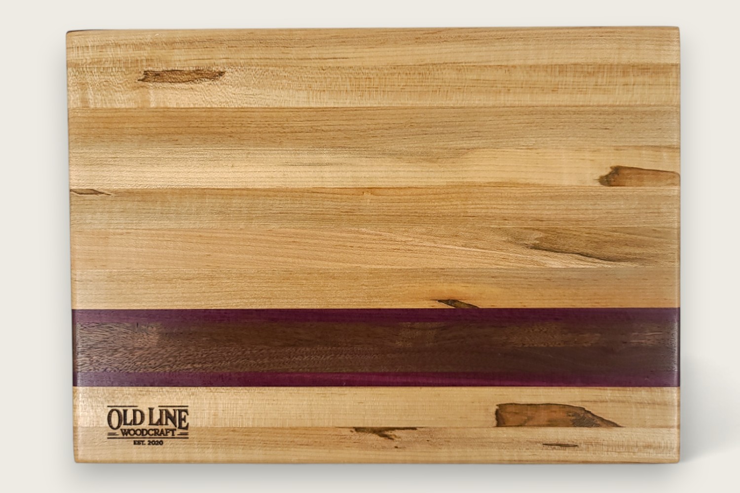 Spaulted Maple Butcher Block Board (#135) with light maple edge grain, horizontal pattern, and recessed handles.
