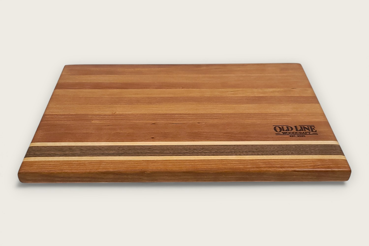 Cherry Hearthwood Serving Board (#235) with edge-grain cherry wood, horizontal pattern, and warm amber tones.