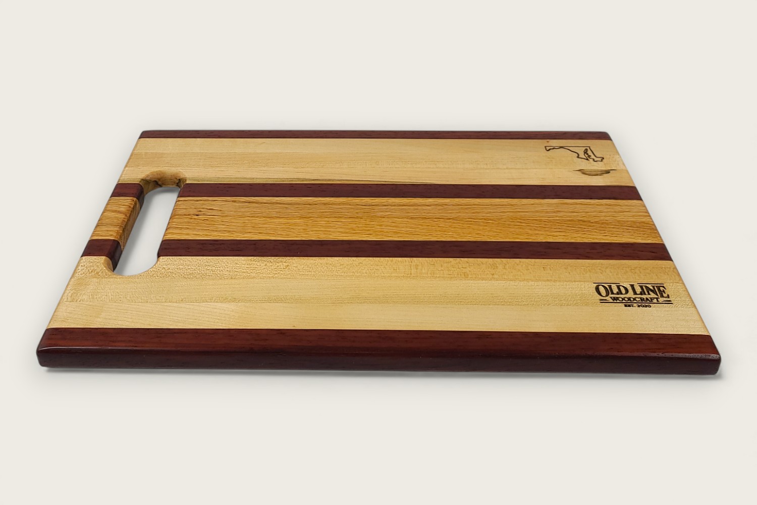Old Line "Maryland" Crabbing Board (#245), maple edge-grain cutting board with horizontal pattern and bone handle.