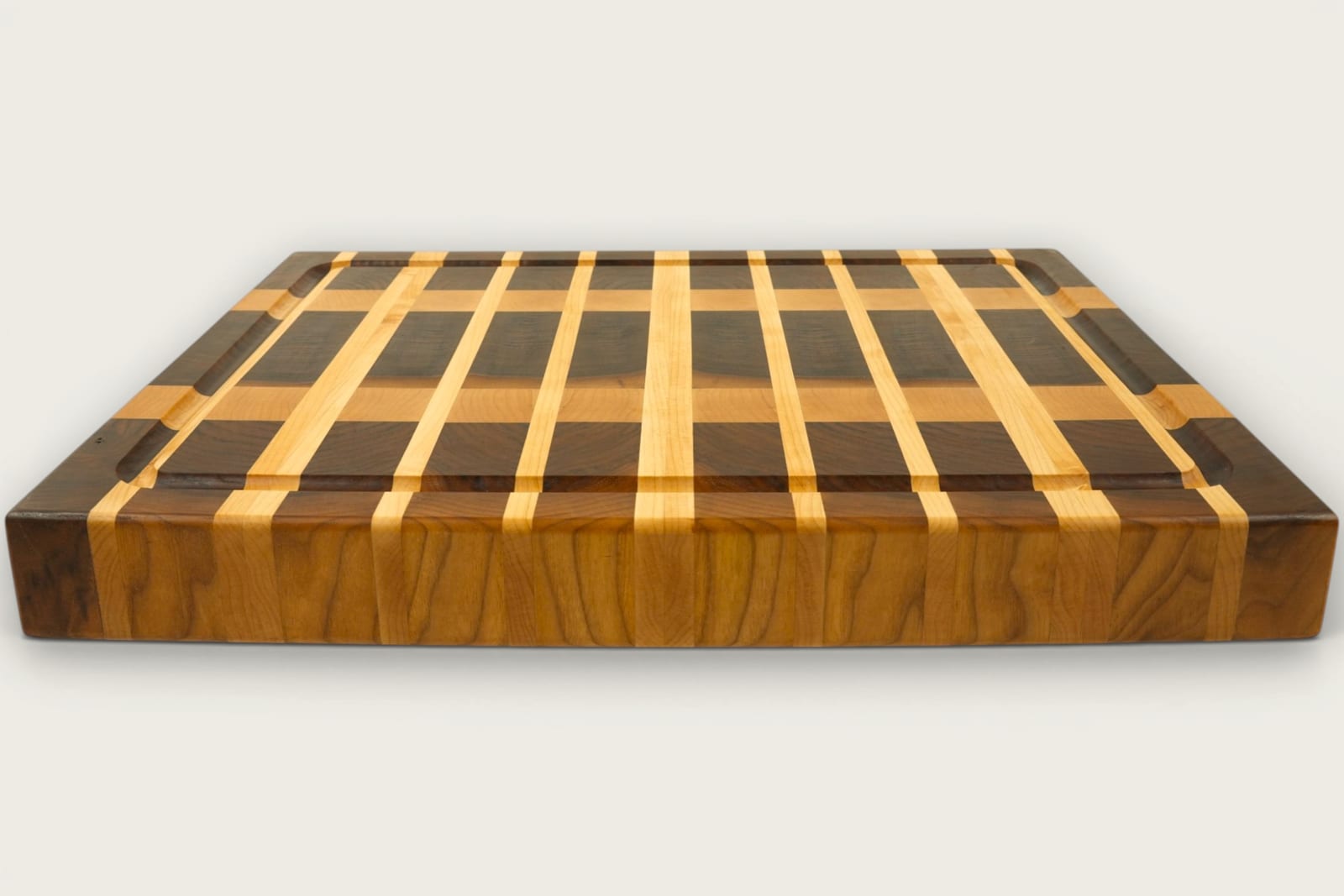 Walnut Ridge End Grain Board featuring rich walnut grain, vertical pattern, rectangular shape, and tung oil finish.