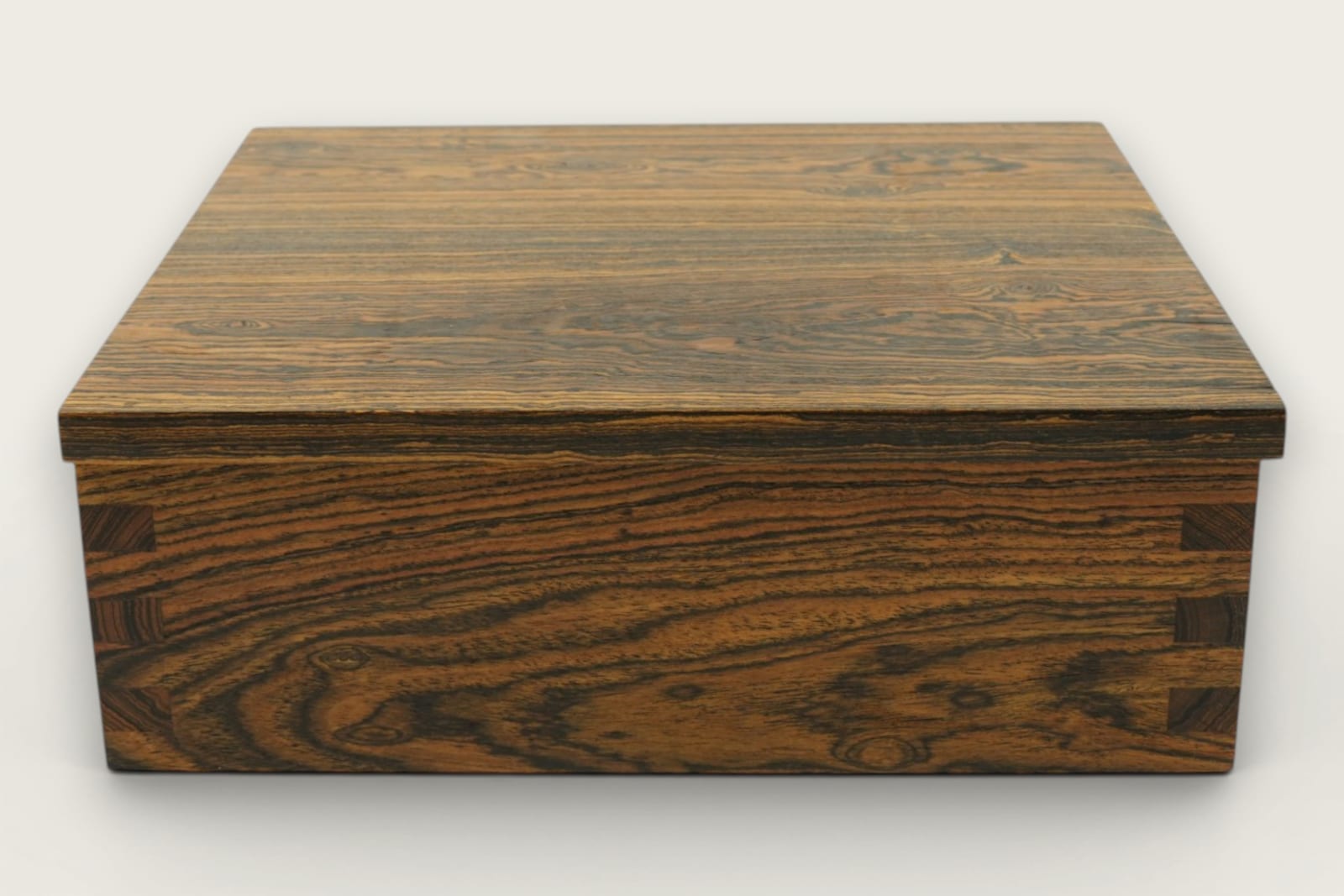 Bocote keepsake box featuring rich brown face grain, rectangular shape, and a smooth tung oil finish.