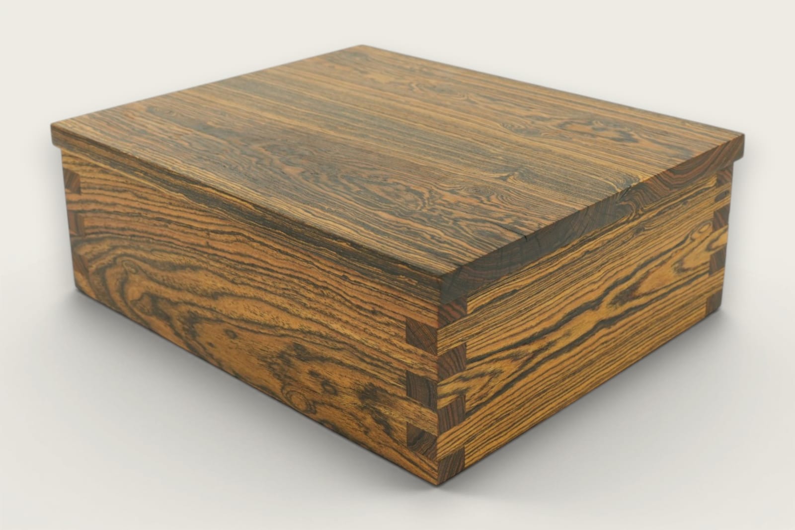 Bocote keepsake box featuring rich brown face grain, rectangular shape, and a smooth tung oil finish.