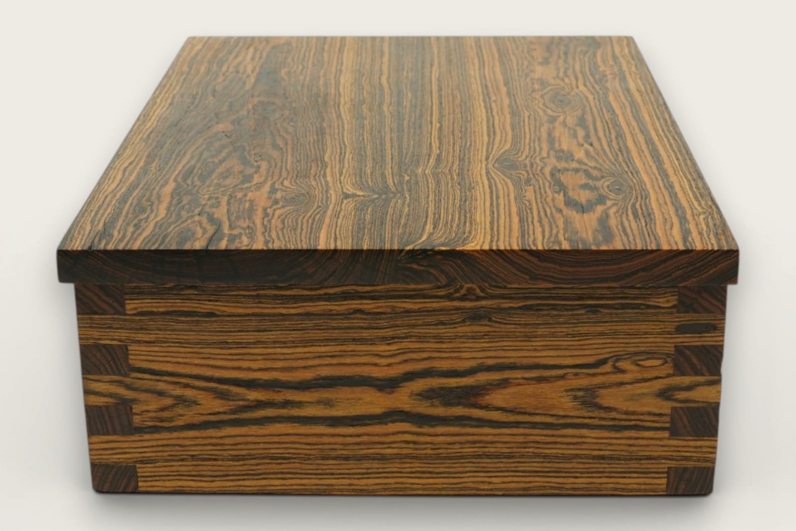 Bocote keepsake box featuring rich brown face grain, rectangular shape, and a smooth tung oil finish.