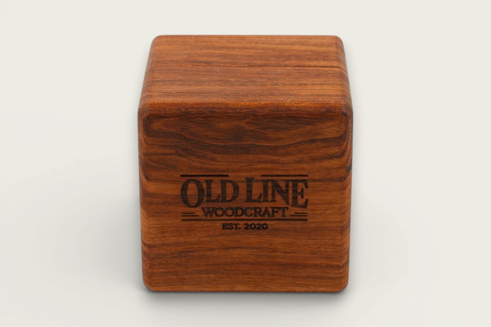 Rosewood engagement ring box with square shape, face grain, warm reddish-brown tones, and tung oil finish.