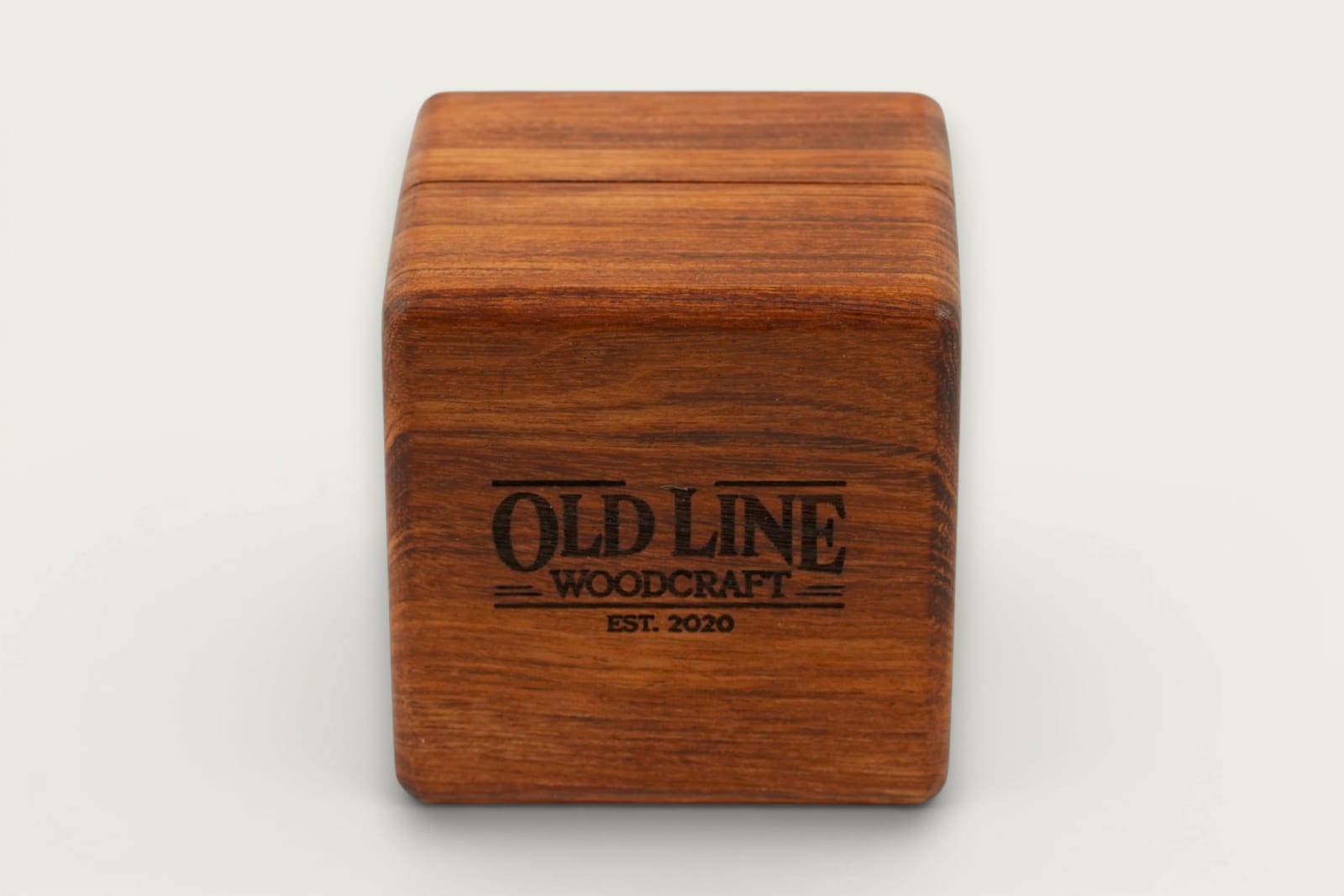 Rosewood Wedding Ring Display Box with face grain, a square shape, tung oil finish, and warm reddish-brown tones.