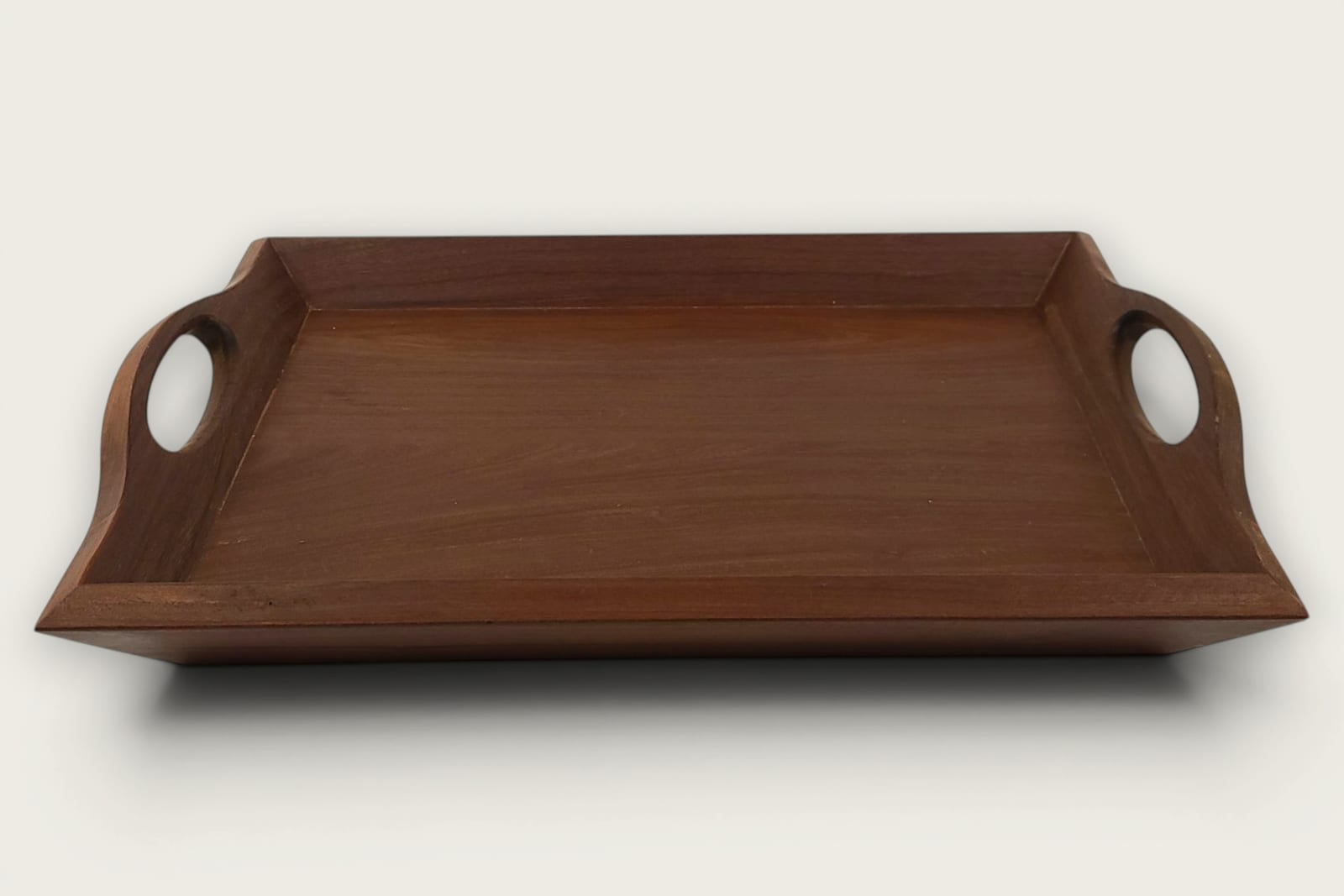Ipe face-grain rectangular serving tray with rich brown tones, tung oil finish, and cutout handles.