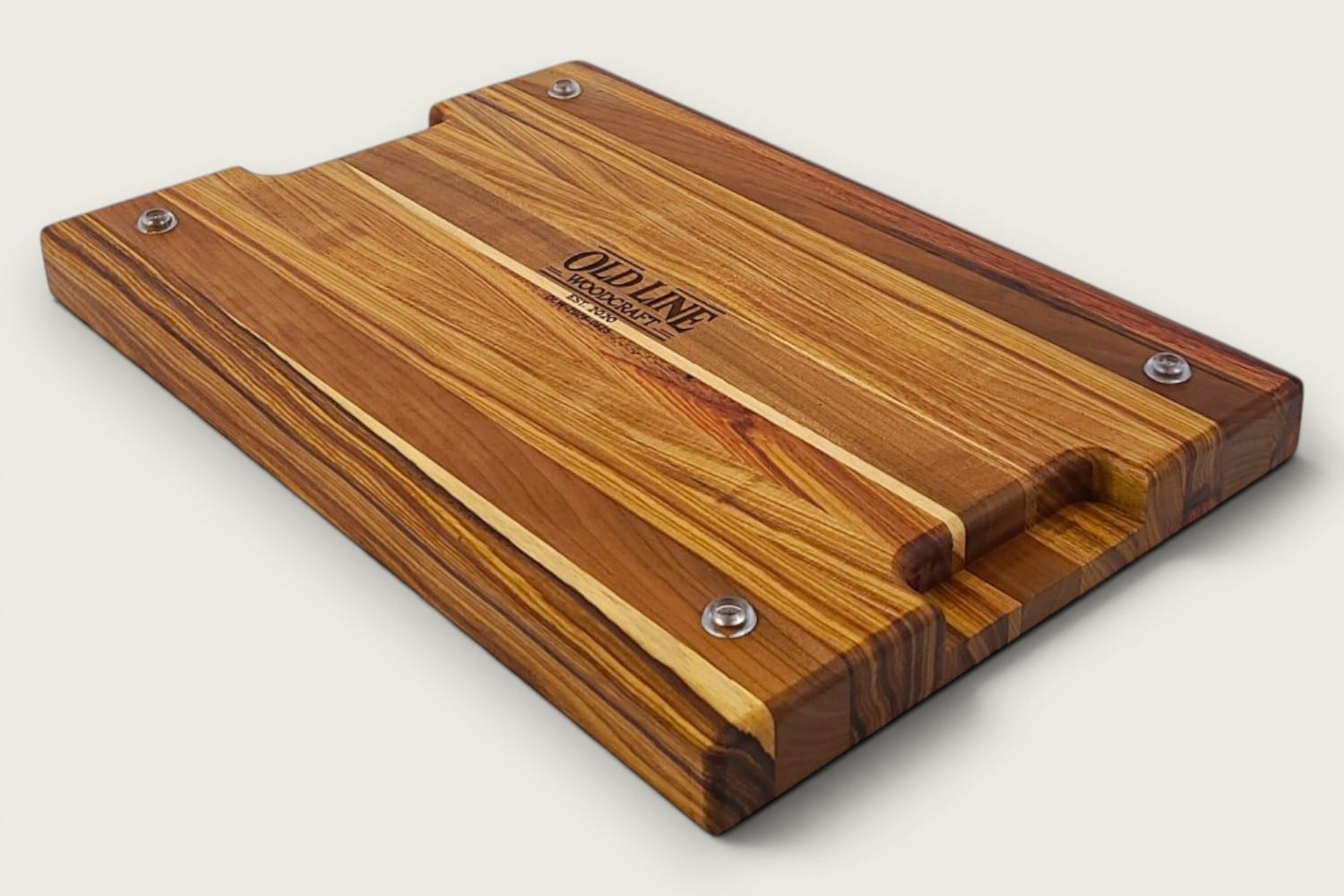 Canary and Cherry Butcher Block Board, edge-grain rectangle in tung oil, warm gold-brown tones, recessed handle.