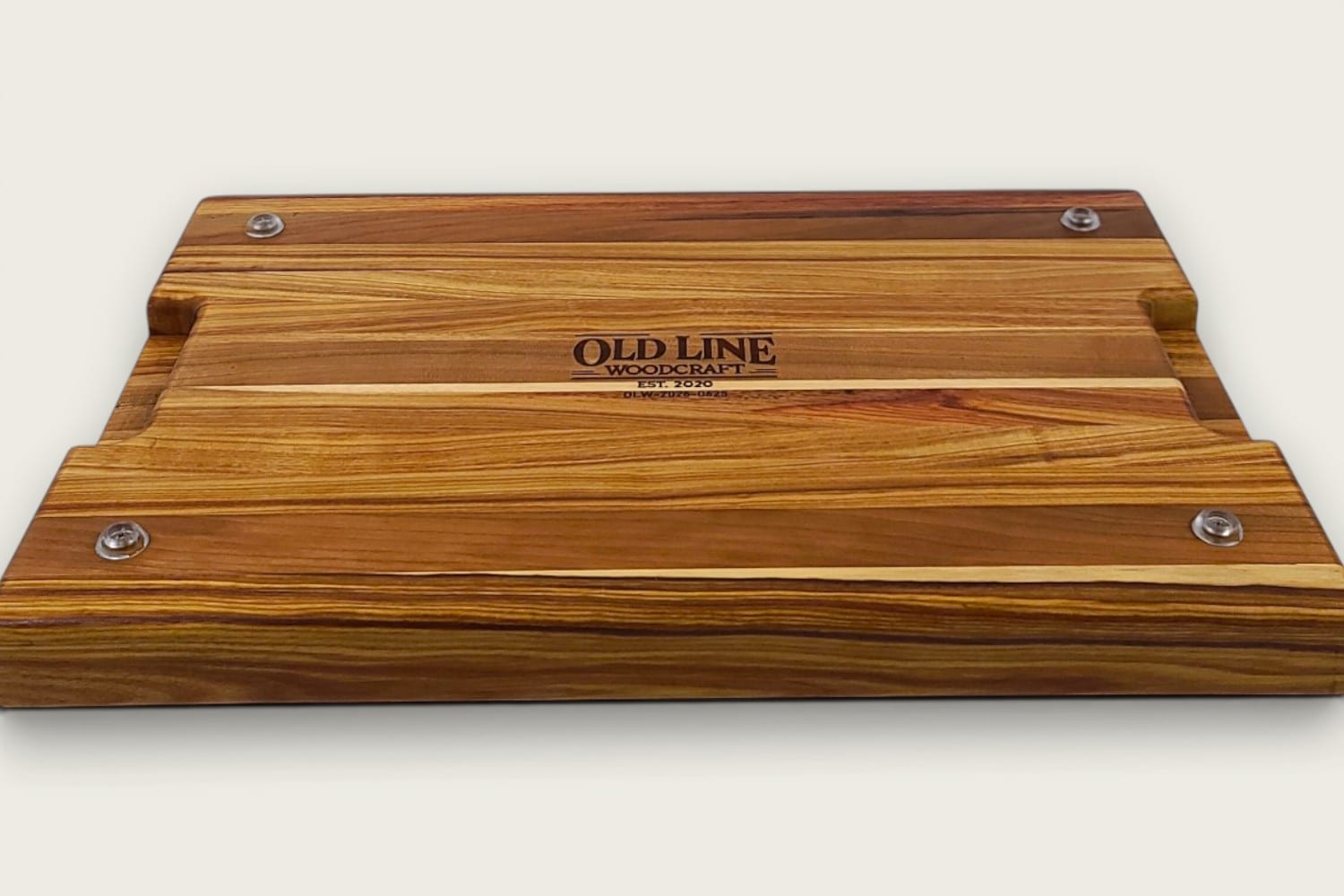 Canary and Cherry Butcher Block Board, edge-grain rectangle in tung oil, warm gold-brown tones, recessed handle.