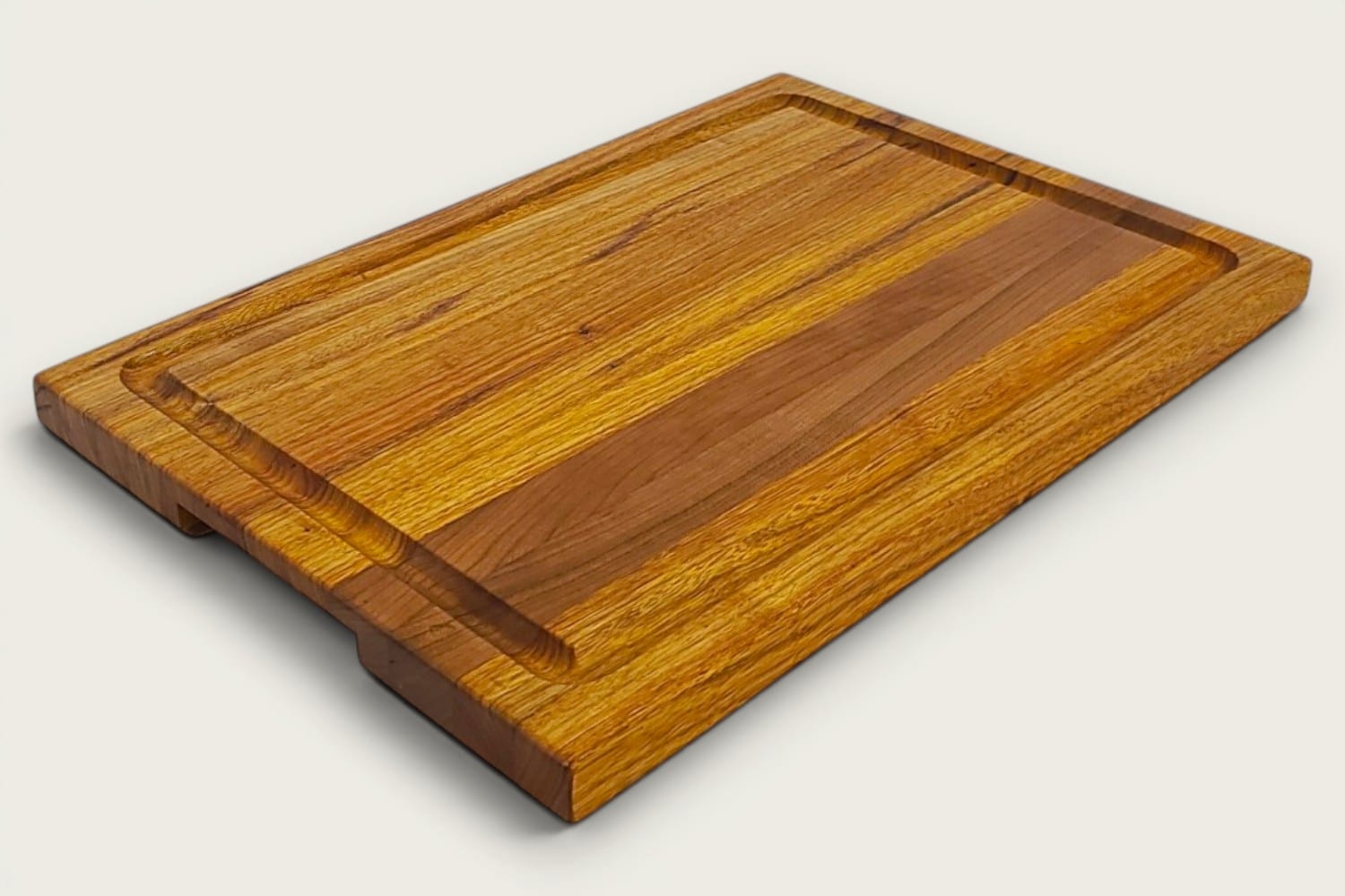 Canary and Cherry Pro Series Board, edge-grain rectangle in tung oil, warm golden-brown tones, juice groove.