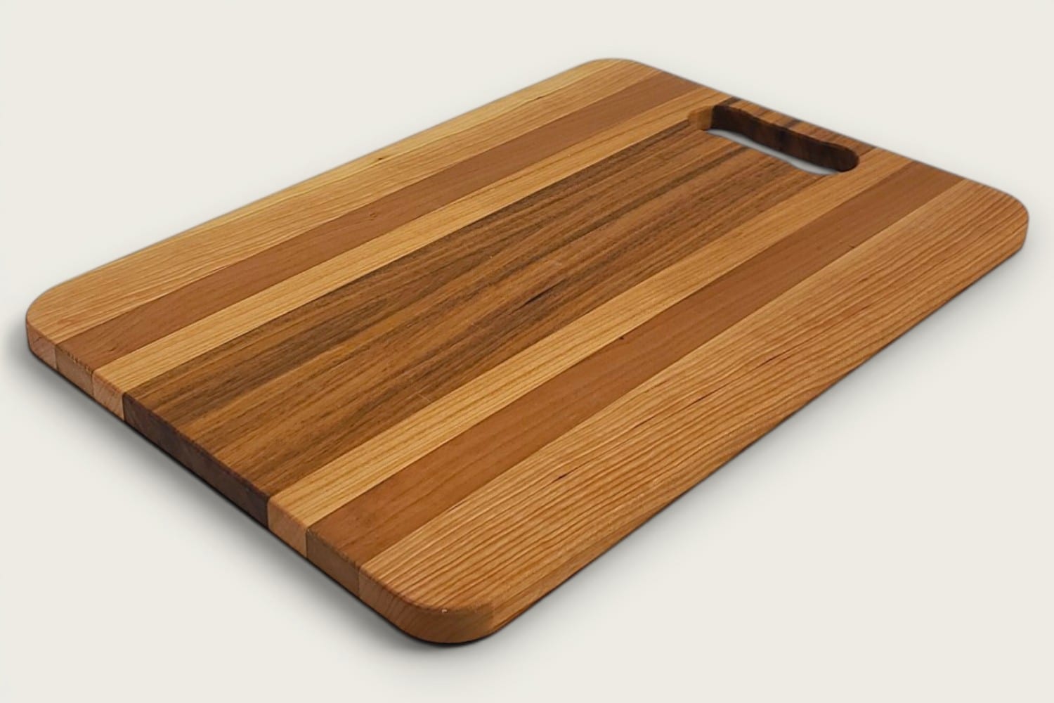 Canary and Cherry Pro Series Board, edge-grain rectangle in warm canarywood with cherry/maple accents, tung-oil finish, bone handle.