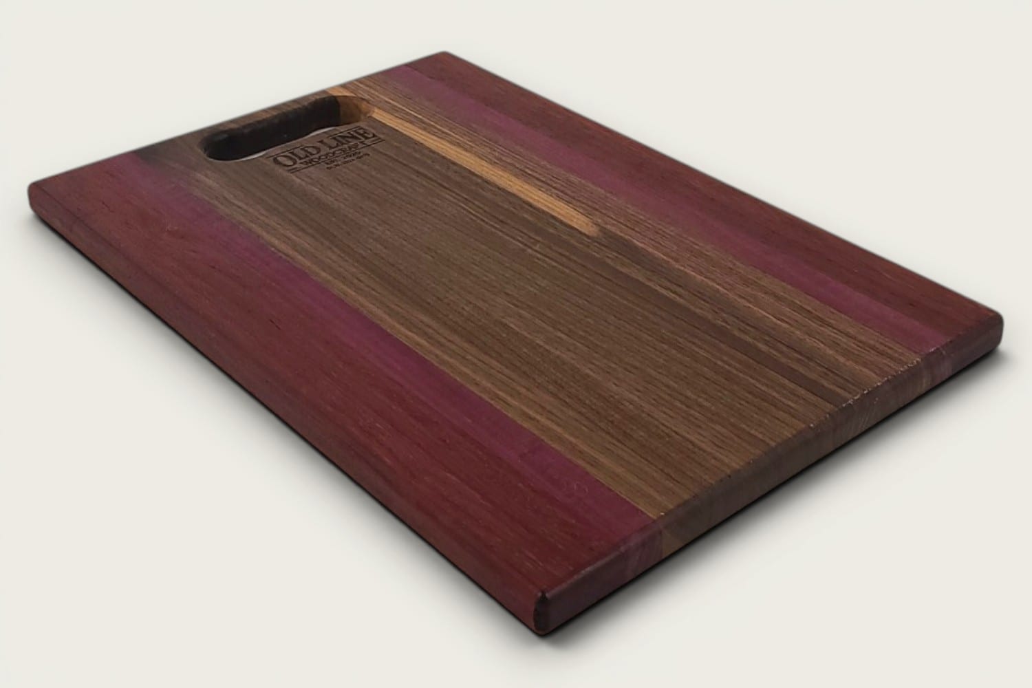 Walnut Padauk Purpleheart Pro Series Board, rectangular edge-grain cutting board with tung-oil finish and OldLine bone handle