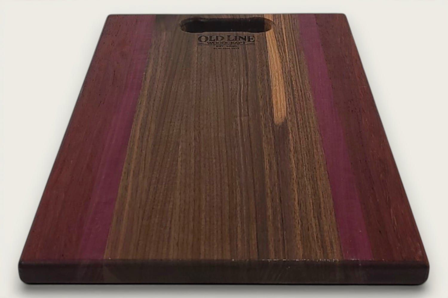 Walnut Padauk Purpleheart Pro Series Board, rectangular edge-grain cutting board with tung-oil finish, bone handle slot.