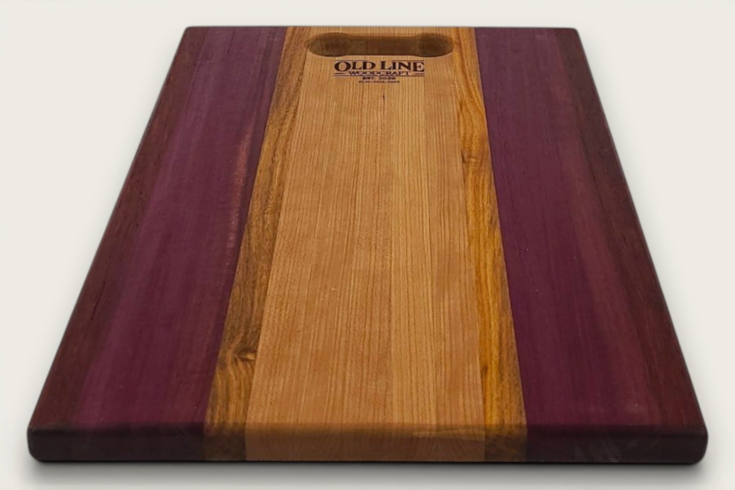Cherry Canary Purpleheart Padauk Pro Series Board, edge-grain rectangle with tung-oil finish and OldLine bone handle