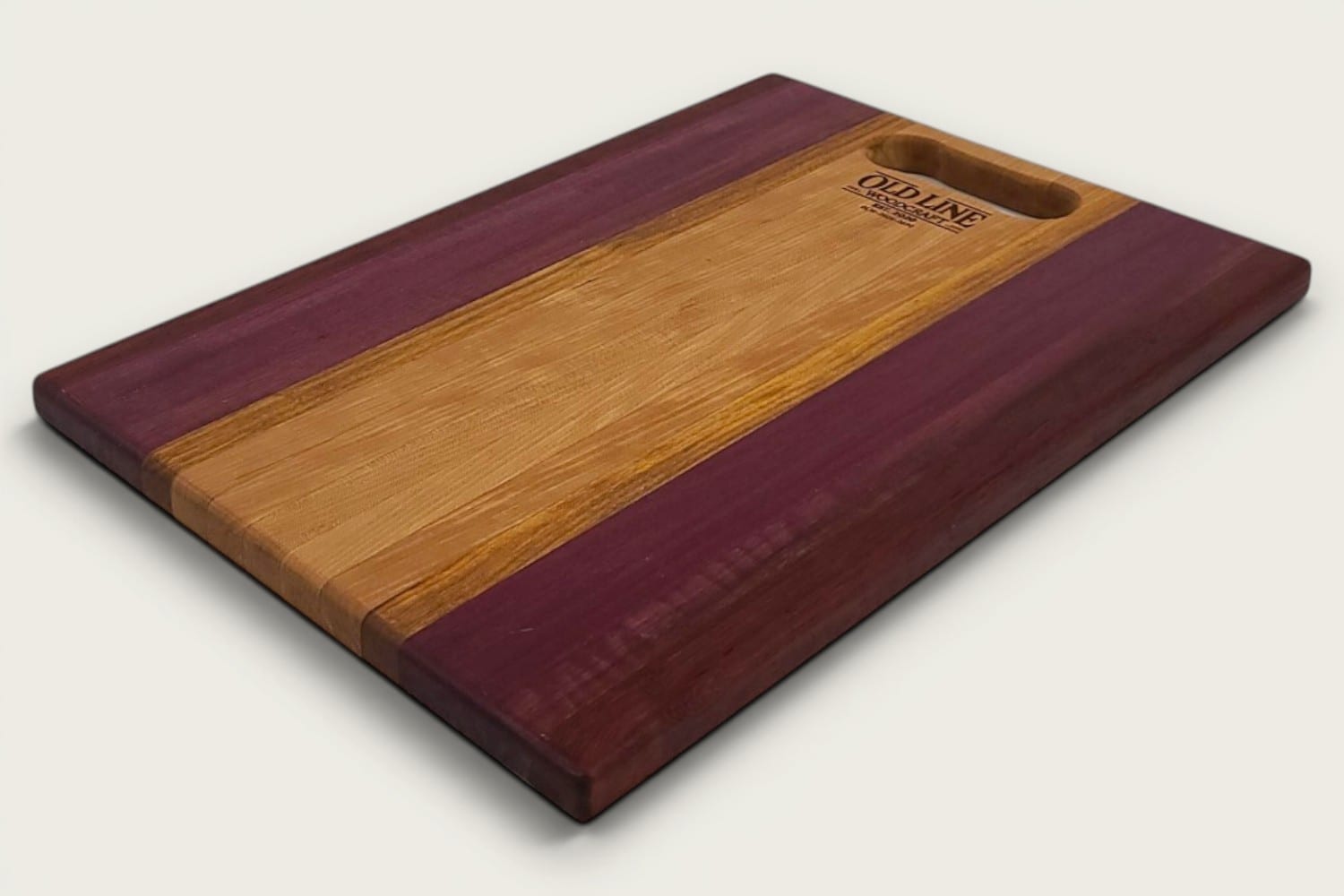 Cherry Canary Purpleheart Padauk Pro Series Board, edge-grain rectangular cutting board with tung-oil finish, cherry center and purpleheart sides, OldLine bone handle.