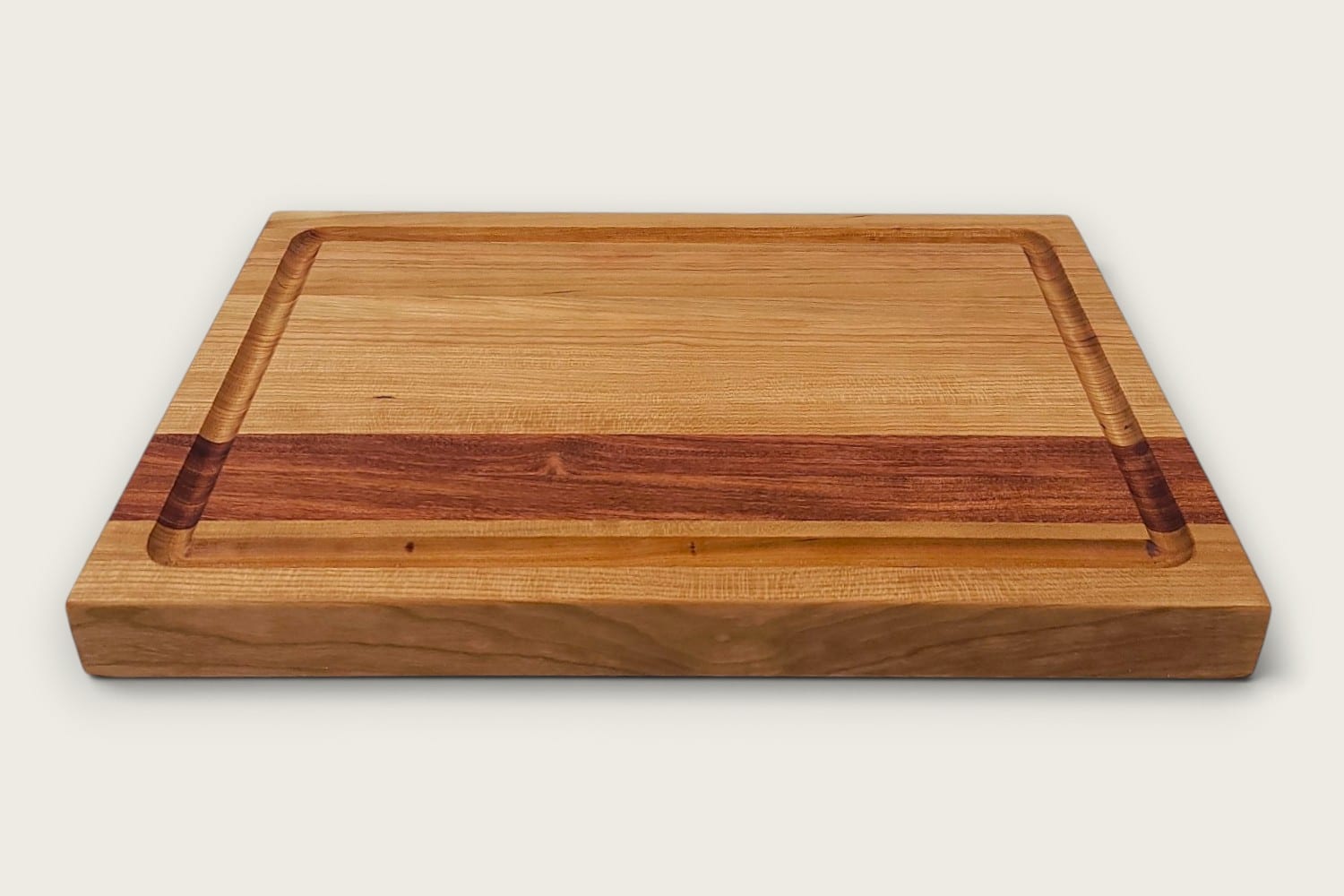 Rosewood & Cherry Butcher Block, cherry edge-grain rectangle with tung oil, rosewood stripe accent.